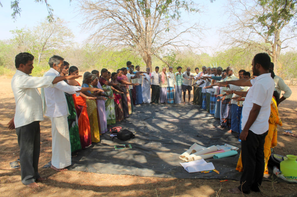 Farmers associated with The Timbaktu Collective taking pledge to use organic practices. Photo courtesy of The Timbaktu Collective