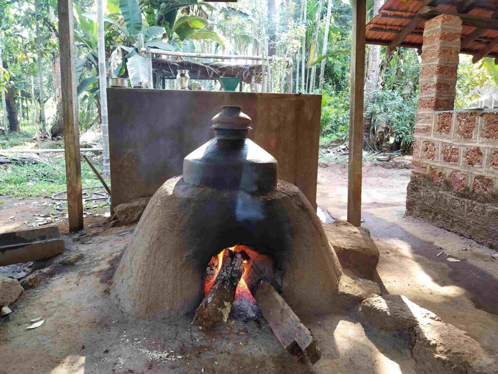 Traditional wood fired still for destillationfor of organic Feni and Urak -at Dudhsagar Plantation, Goa-Pure & Eco India